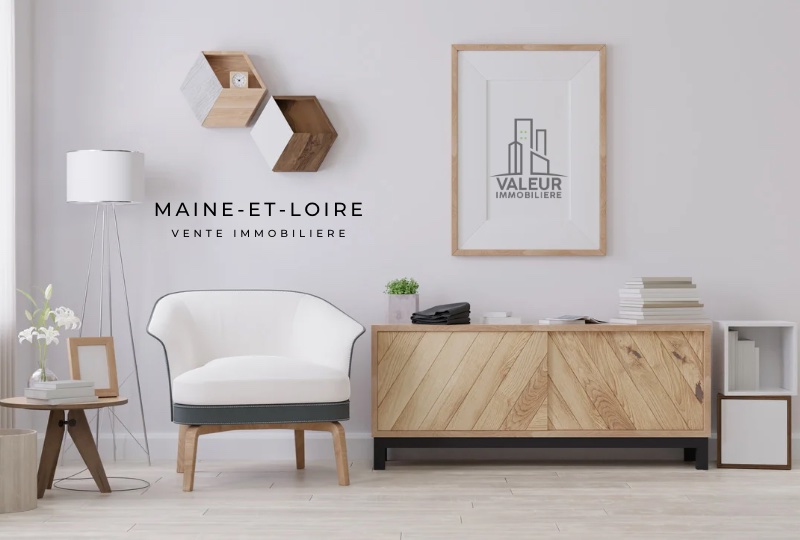 Intérieur cosy avec logo Valeur Immobiliere - Agence immobilière Angers